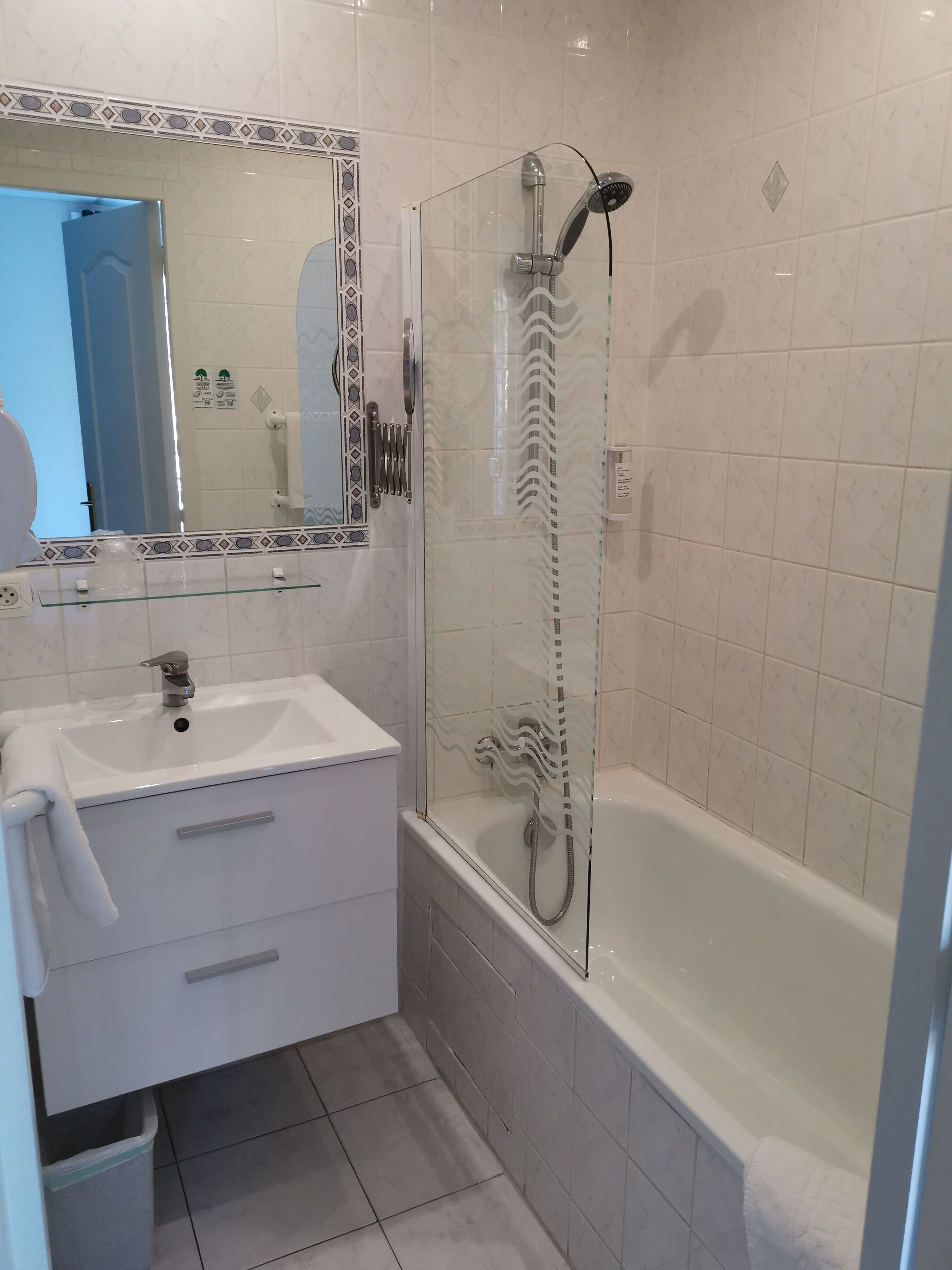 superior double room | bathroom | hair dryer, towels