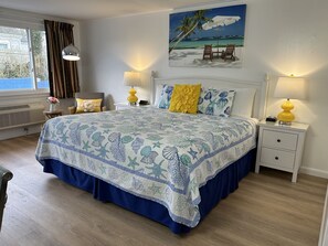 Premium bedding, down comforters, blackout drapes, iron/ironing board