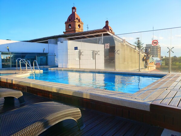 Outdoor pool, sun loungers