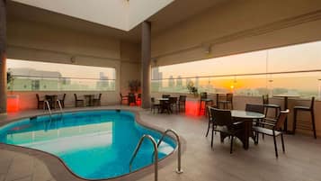 Outdoor pool, pool umbrellas, pool loungers