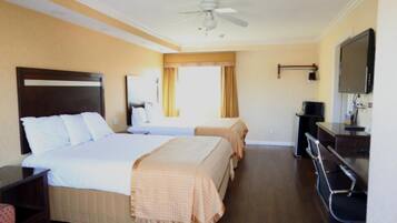 Camas con pillow-top, escritorio y espacio para trabajar con laptop