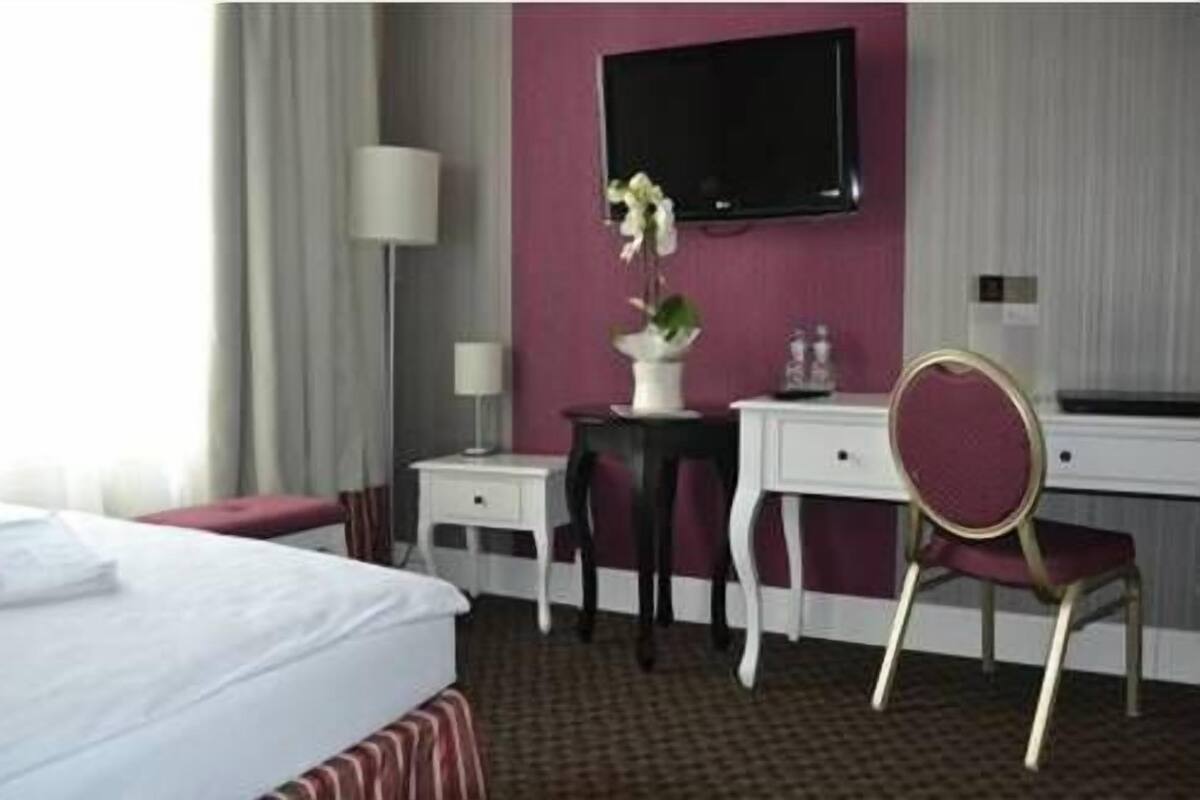 Premium bedding, down comforters, desk, iron/ironing board (on request)