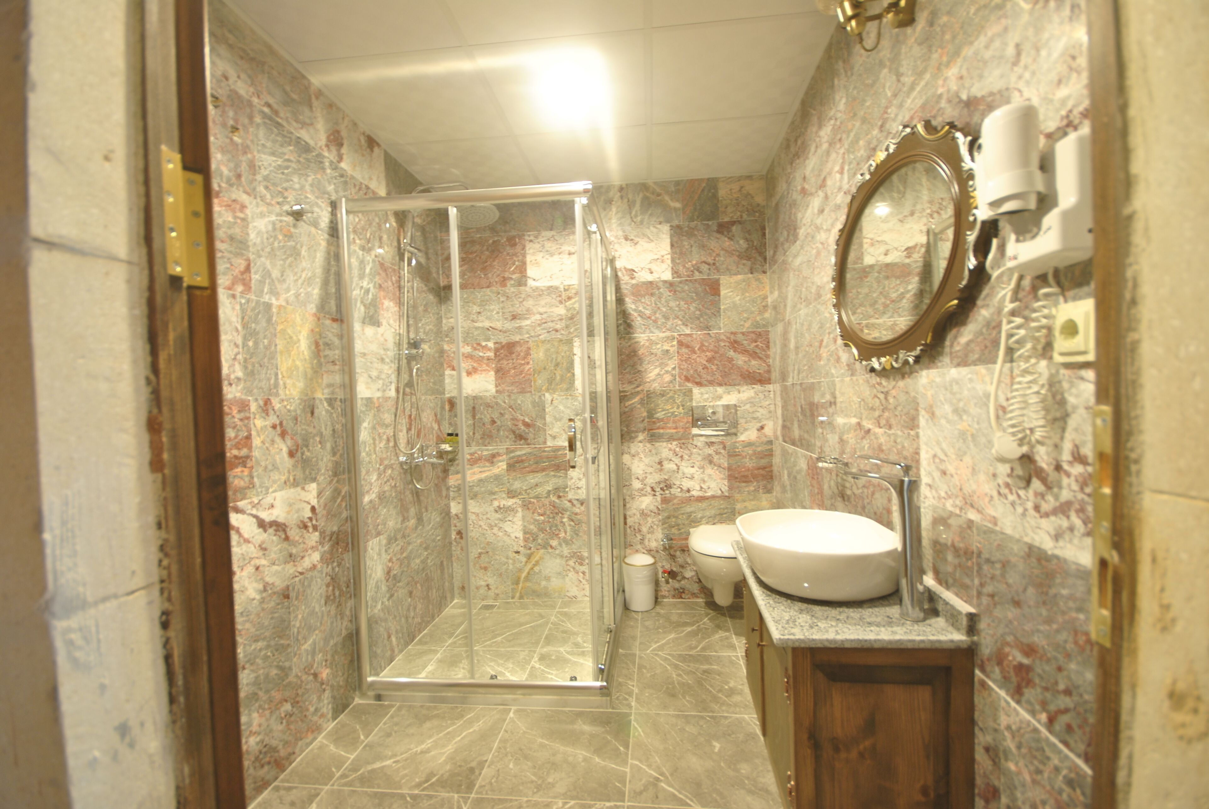 family suite, 1 queen bed, city view, courtyard area | bathroom | shower, rainfall showerhead, free toiletries, hair dryer