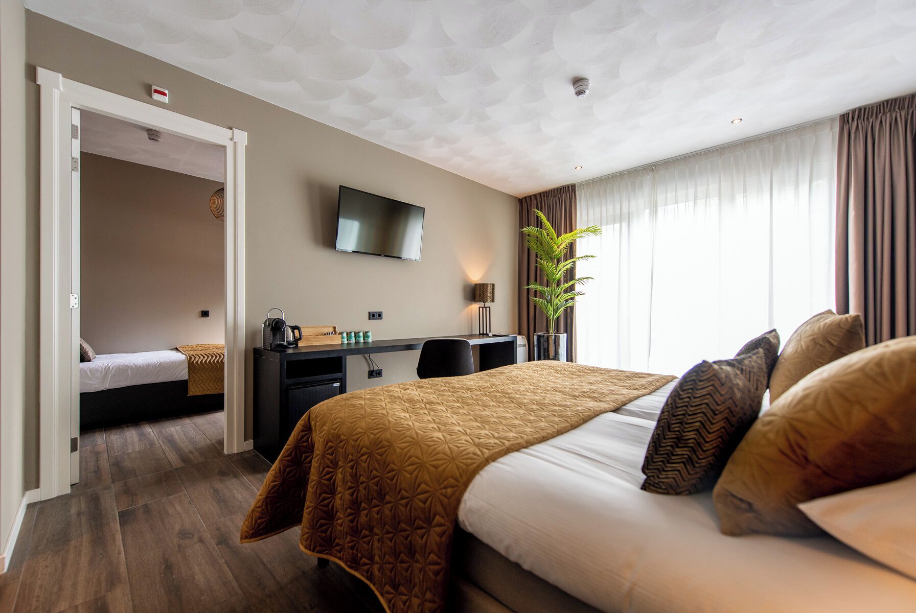 Deluxe Room, 2 Bedrooms | Hypo-allergenic bedding, in-room safe, desk, laptop workspace