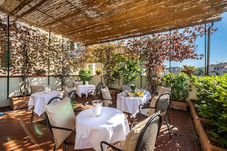 Outdoor dining. Hotel Emma