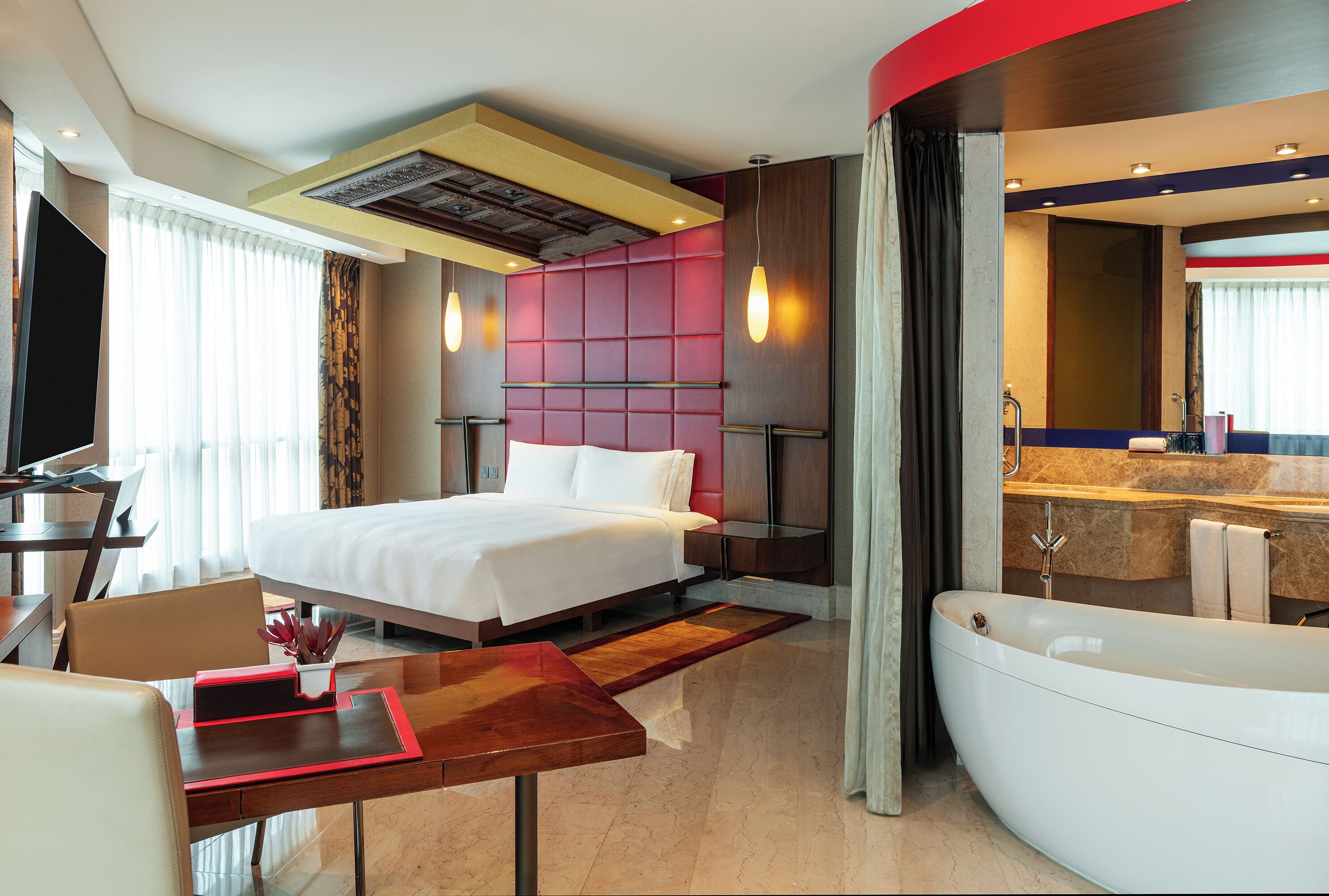 Ylelliset vuodevaatteet, Select Comfort -patjalliset sängyt, minibaari