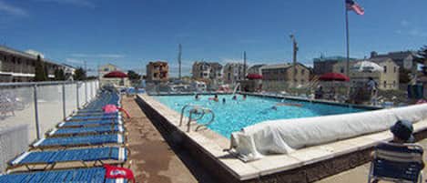 Seasonal outdoor pool, pool loungers