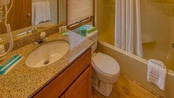 Combined shower/bathtub, hair dryer, towels
