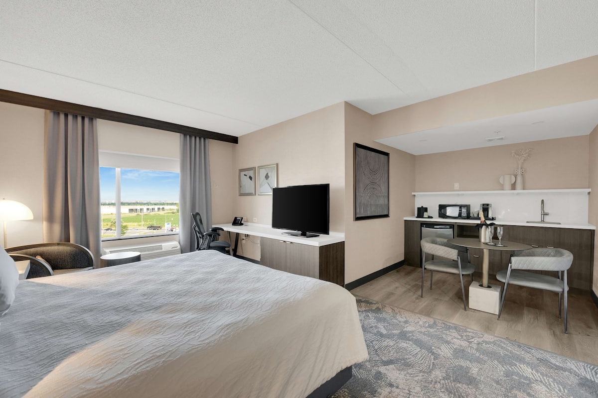 Chambre Deluxe, 1 trÚs grand lit | Coffre-fort, fer et planche à repasser, lit de bébé (gratuit)