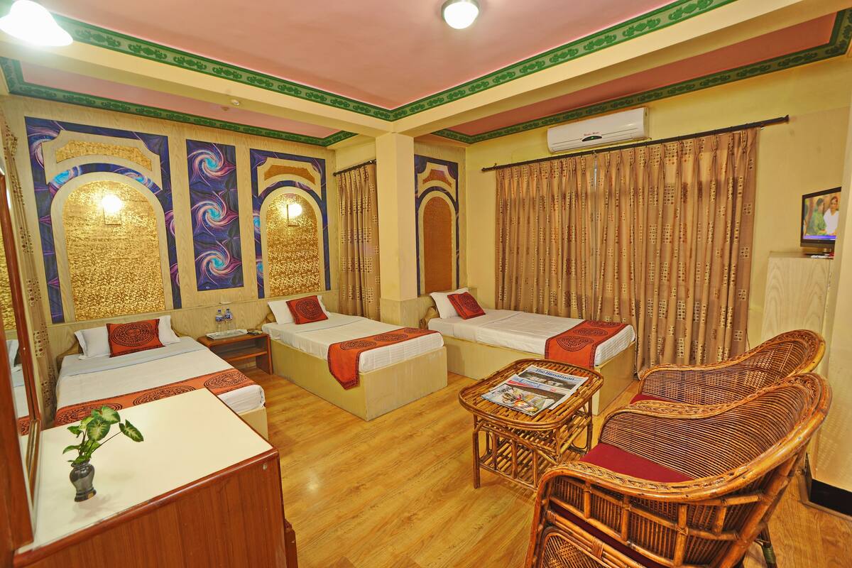 Room ( Garden Facing Triple With AC) | Memory foam beds, in-room safe, desk, WiFi (free)
