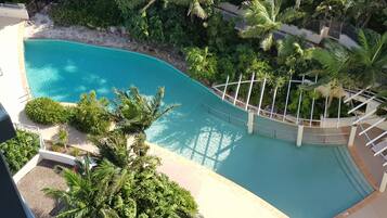 Outdoor pool, pool umbrellas, sun loungers