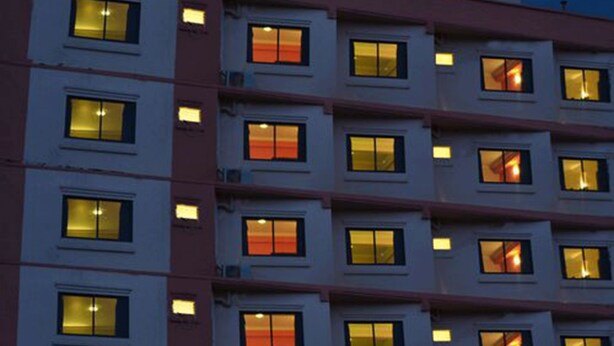 A multi-story building with uniformly arranged windows and balconies. - Cascade Hotel (Kathmandu)