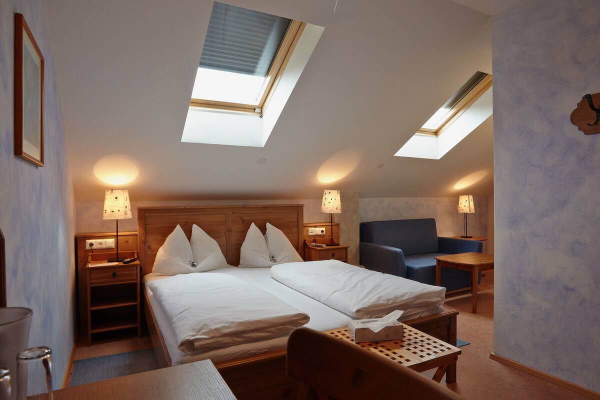 Premium bedding, desk, blackout drapes, iron/ironing board (on request)