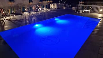 Seasonal outdoor pool, open 9:00 AM to 7:30 PM, pool umbrellas