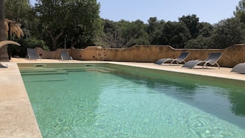 Outdoor pool, pool umbrellas, pool loungers