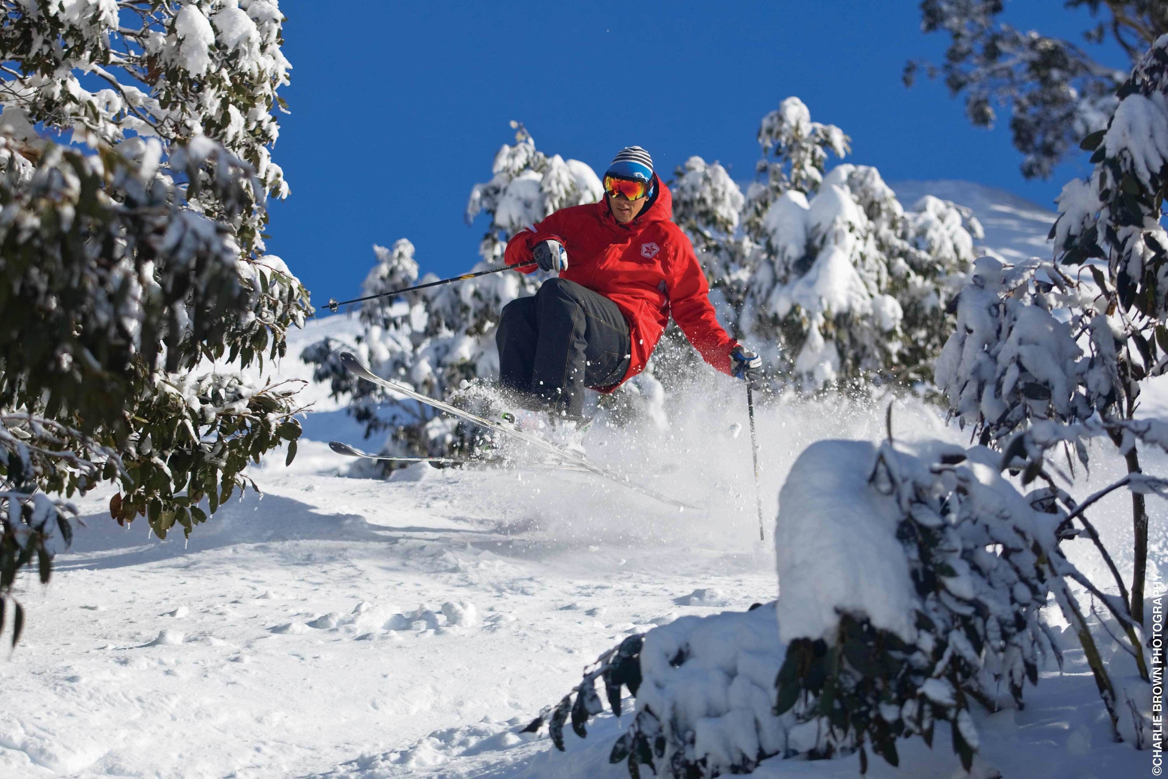 A person skiing on a snow-covered slope.