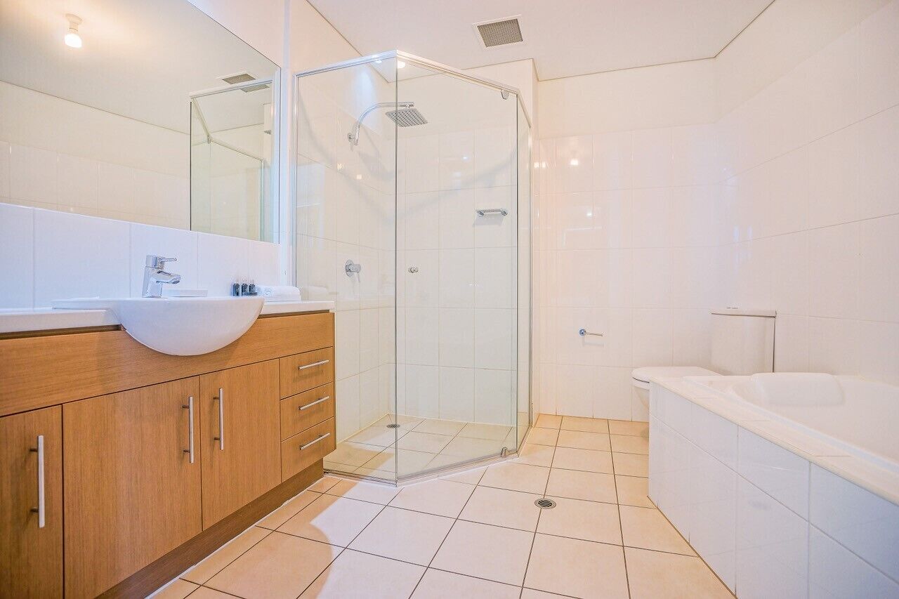 executive apartment | bathroom | rainfall showerhead, designer toiletries, hair dryer, towels
