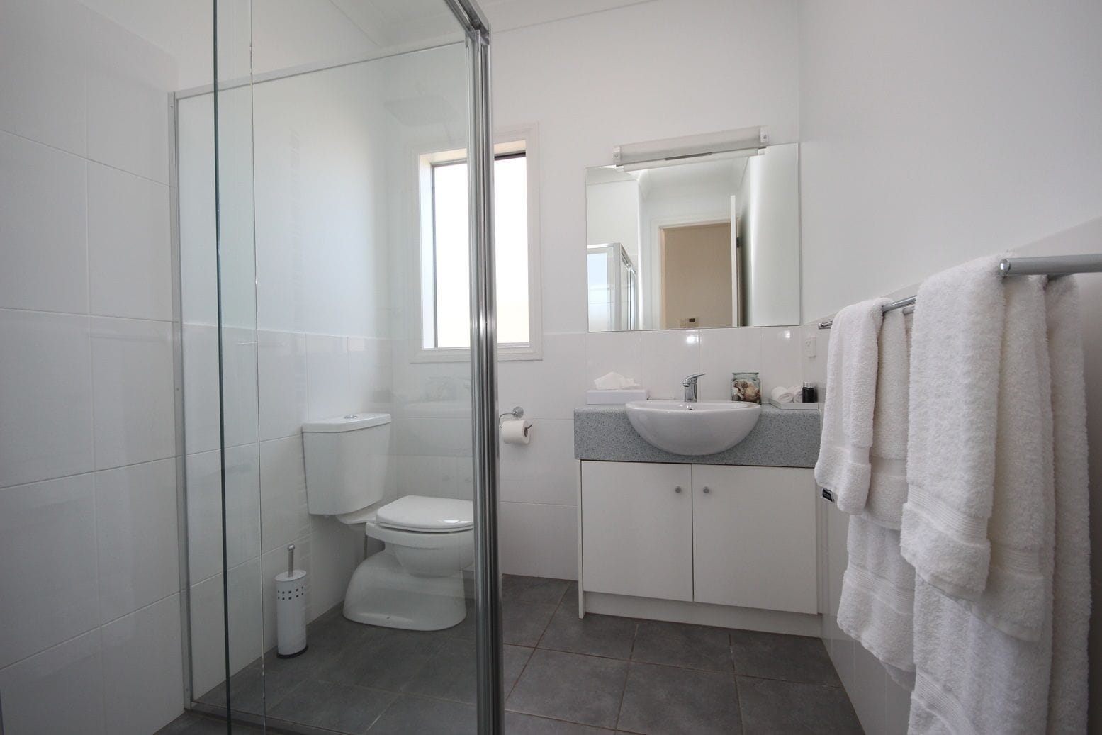 deluxe townhome, 3 bedrooms | bathroom | rainfall showerhead, designer toiletries, hair dryer, towels