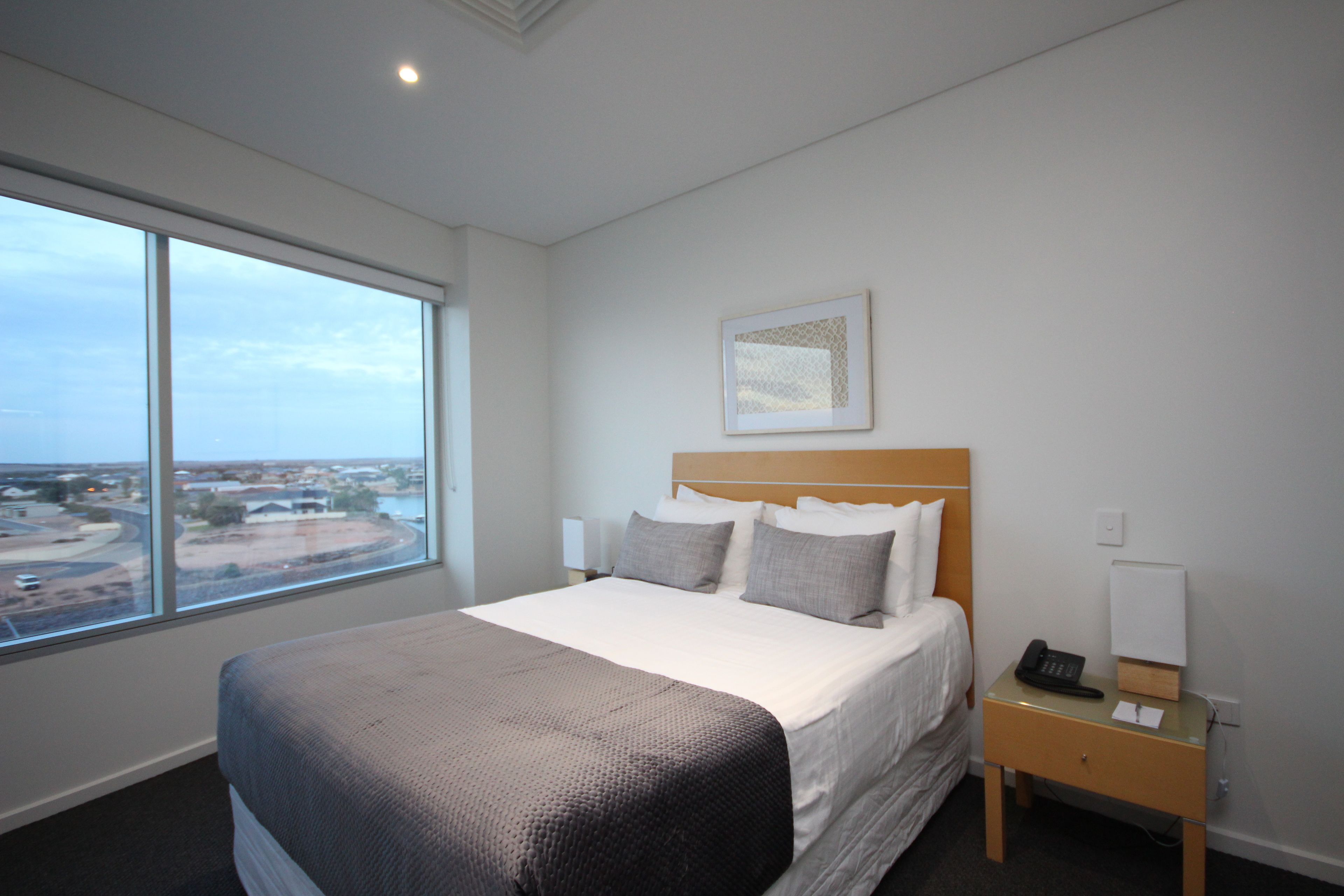 penthouse, 2 bedrooms | individually furnished, desk, blackout curtains, iron/ironing board