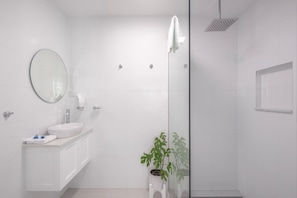 Shower, rainfall showerhead, hair dryer, towels
