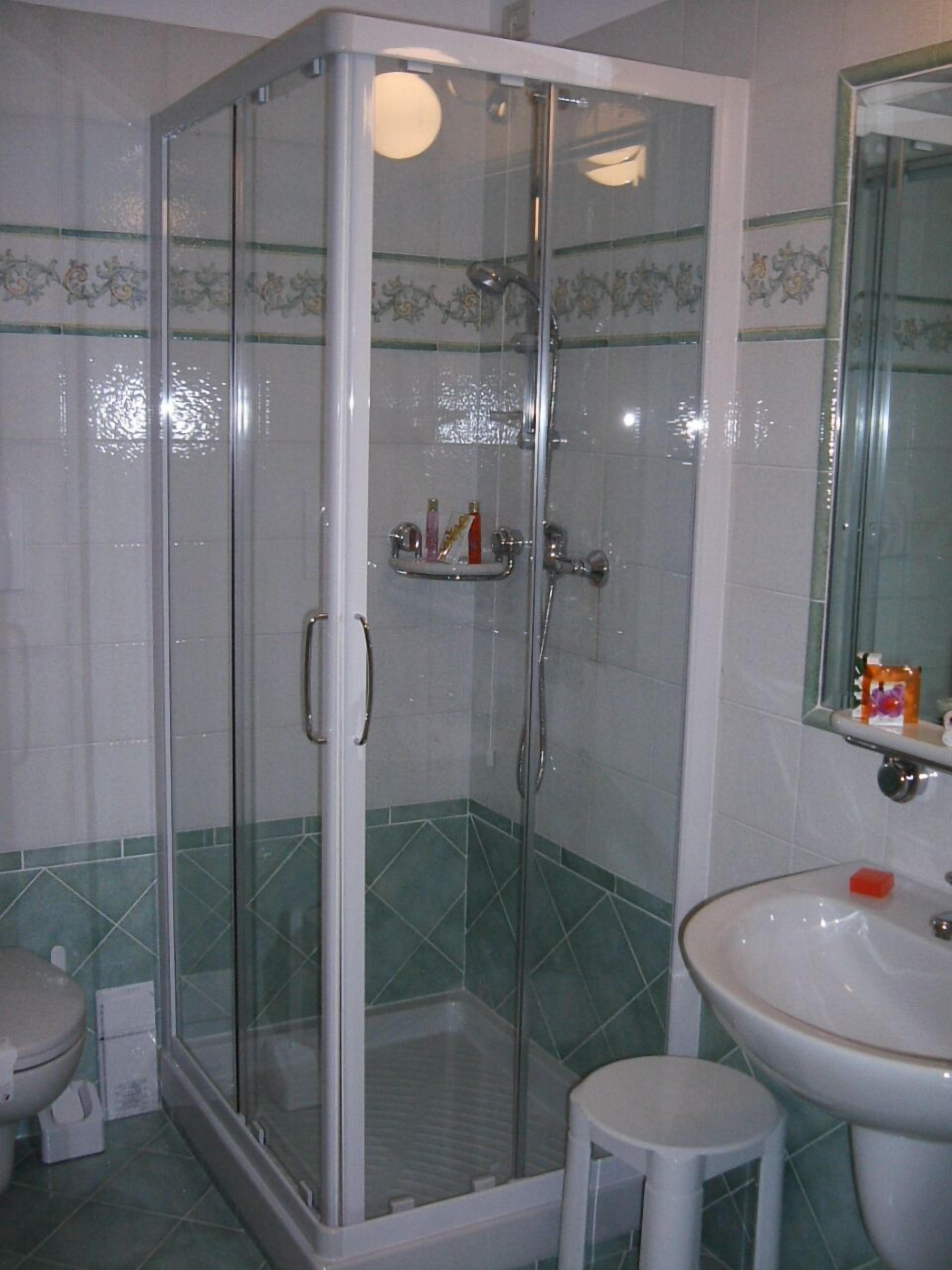 shower, free toiletries, hair dryer, bathrobes