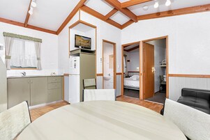 Premium bedding, down comforters, desk, iron/ironing board