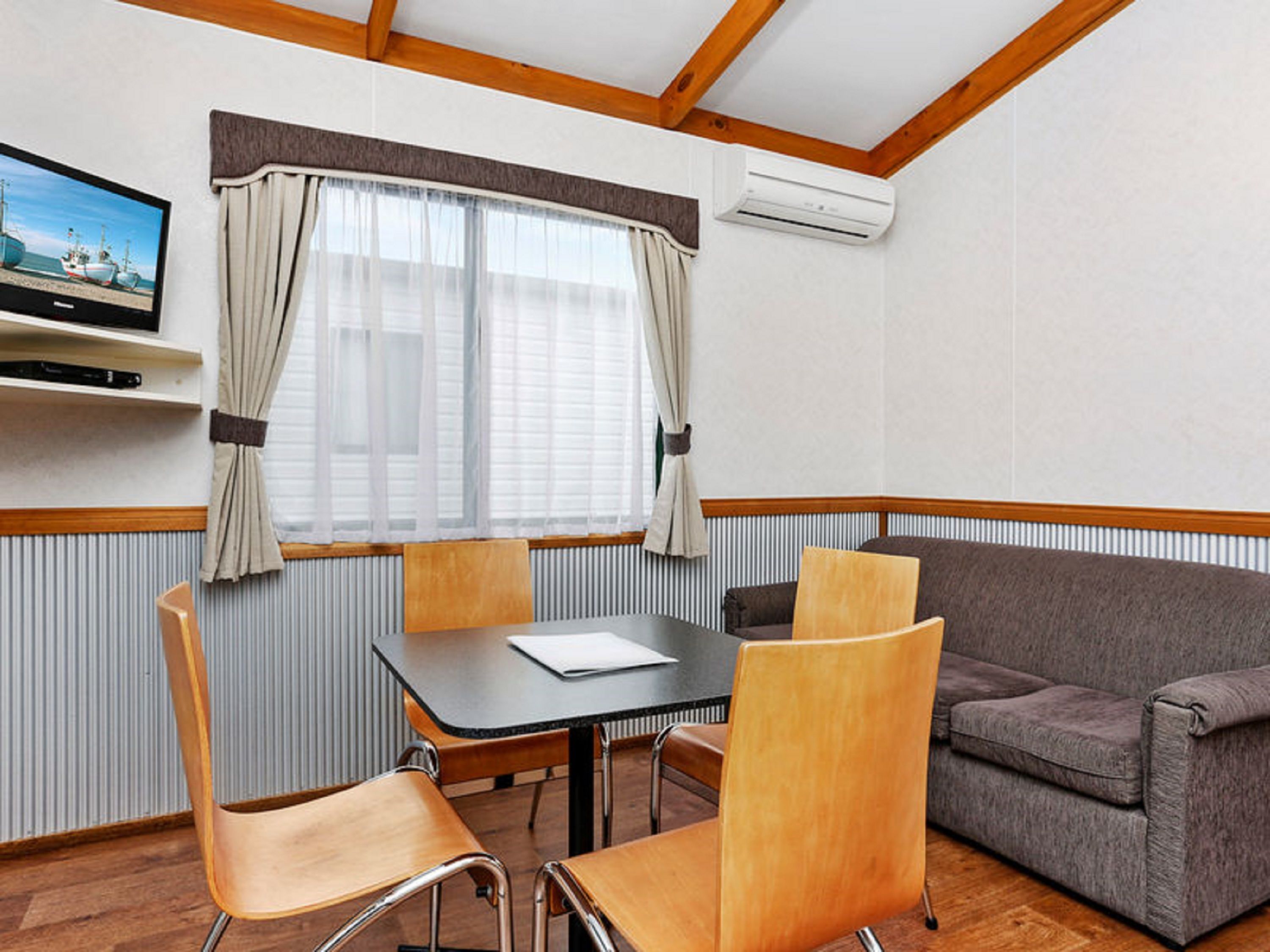 Deluxe One Bedroom Cabin | Premium bedding, down duvets, desk, iron/ironing board (on request)