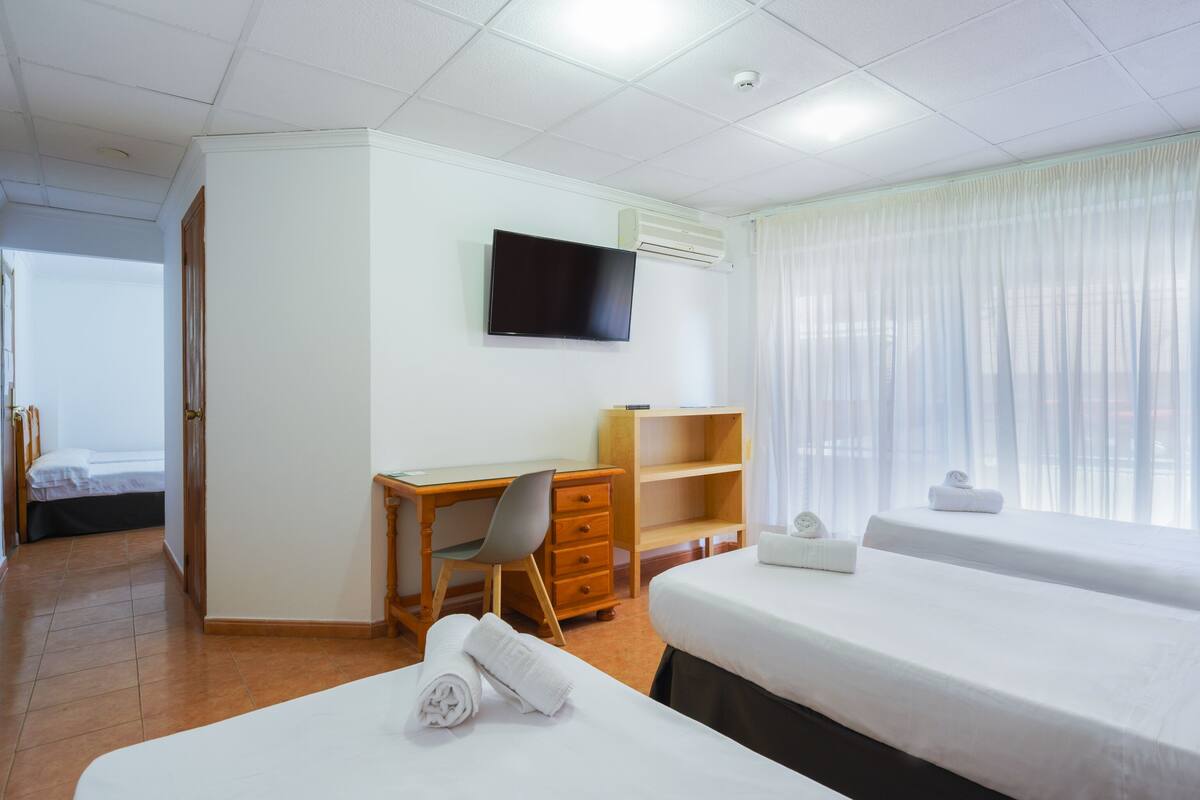 Family Room | Desk, iron/ironing board (on request), free WiFi, bed sheets
