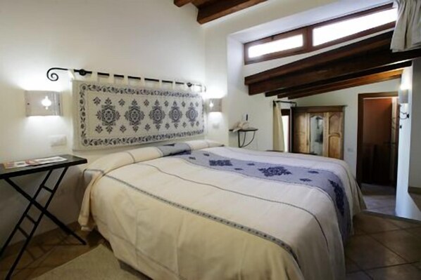 1 sovrum, italienska Frette-lakan, duntäcken och bäddmadrasser