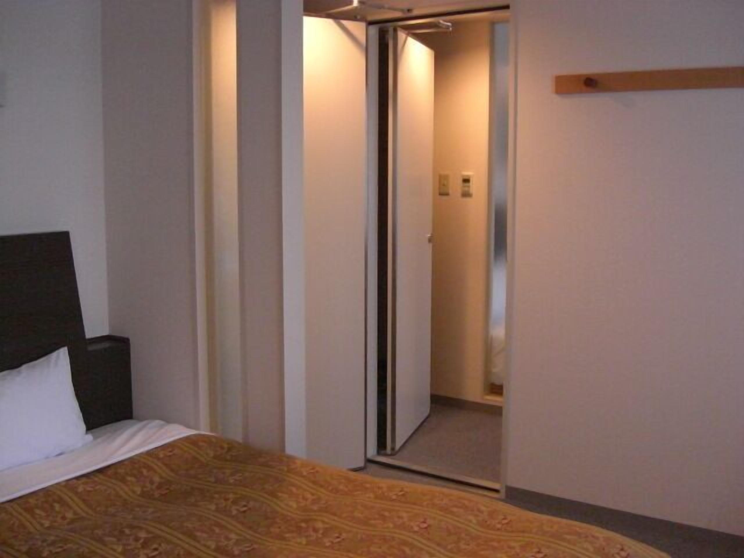 Desk, laptop workspace, blackout drapes, iron/ironing board