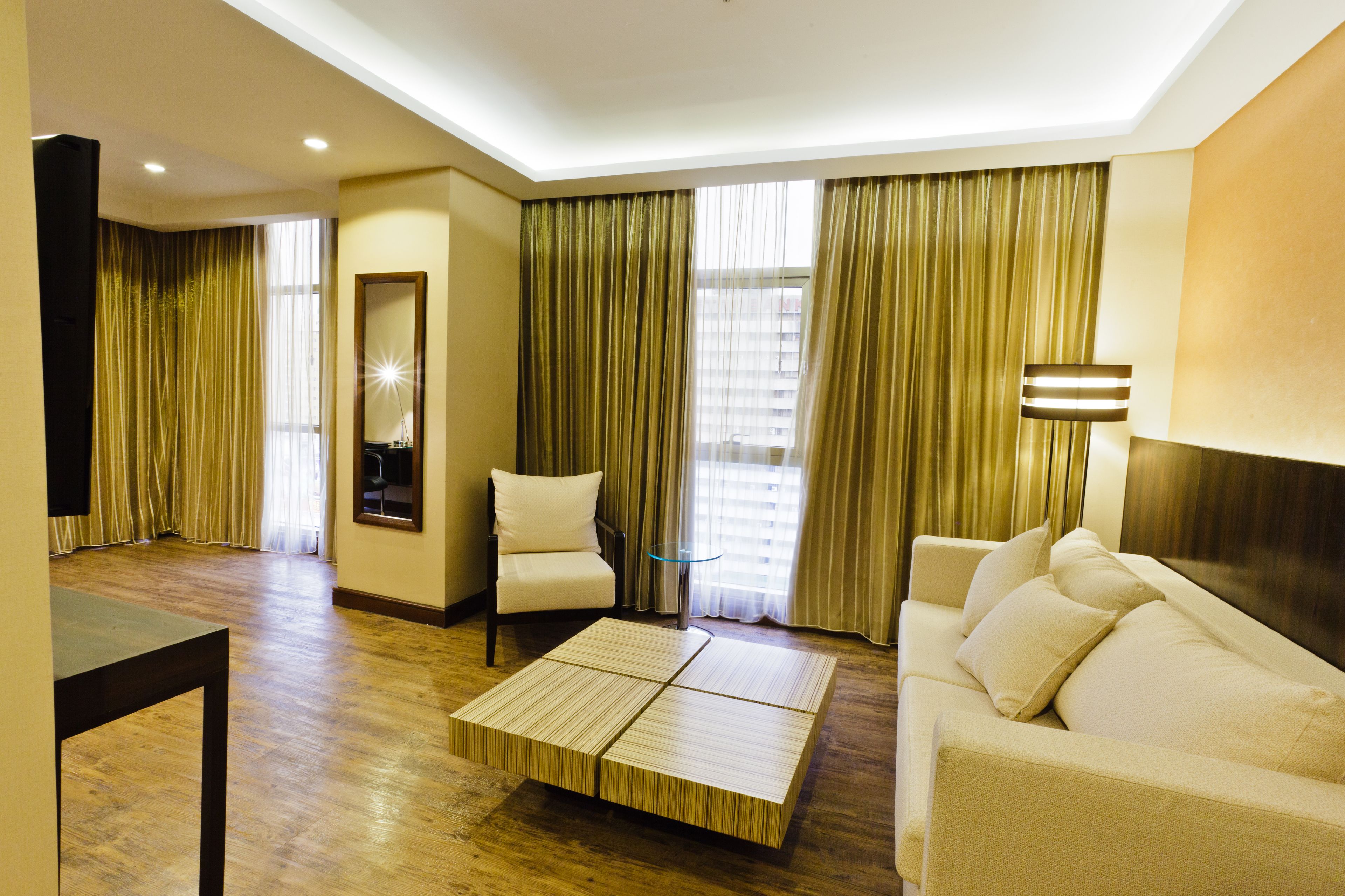 ramada suite | living room | 32-inch flat-screen tv with cable channels, tv