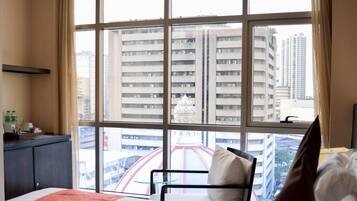 Superior Room | Minibar, in-room safe, desk, laptop workspace