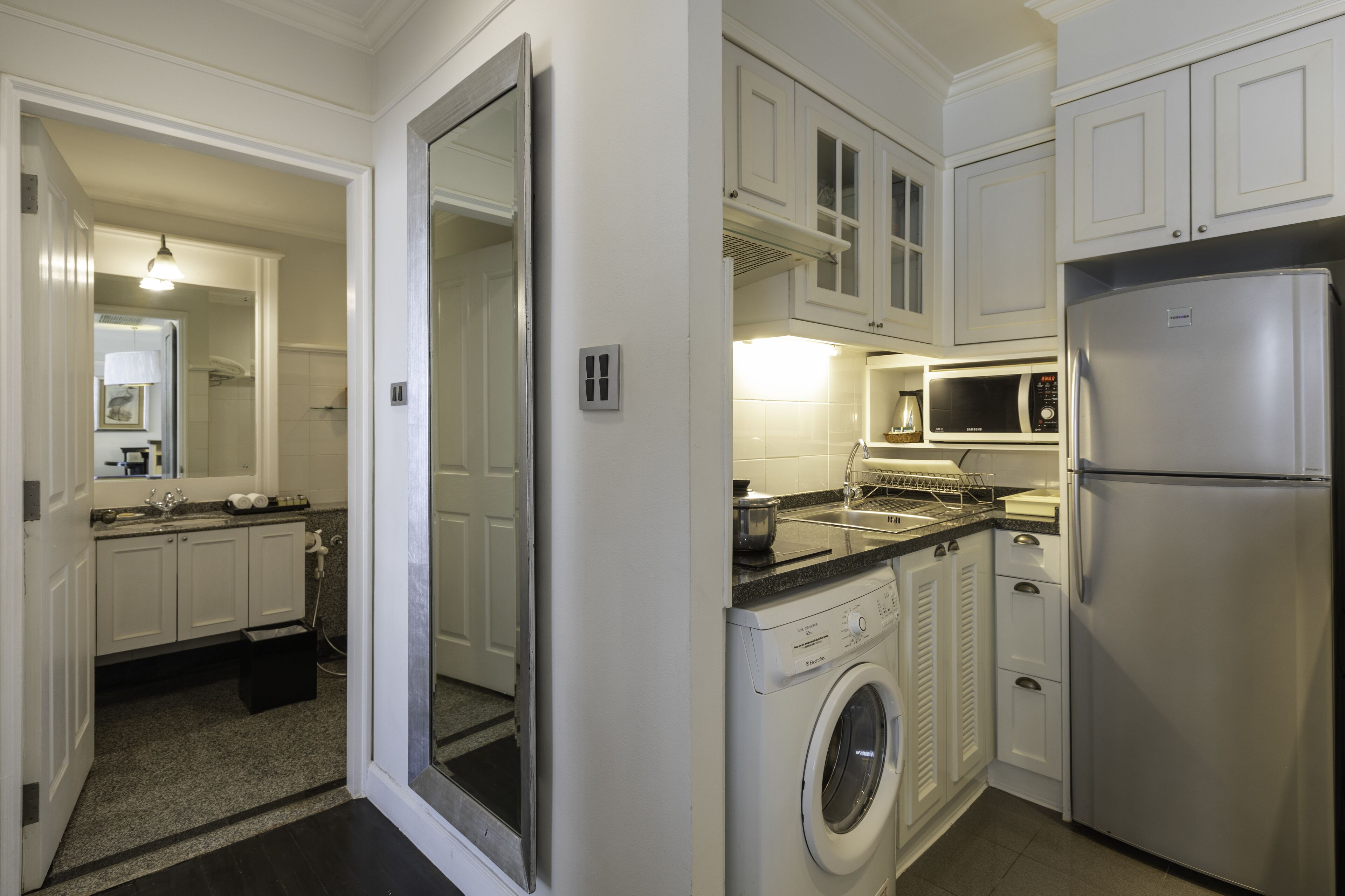 one bedroom suite with free executive lounge | private kitchen | full-sized fridge, microwave, coffee/tea maker, cookware/dishes/utensils