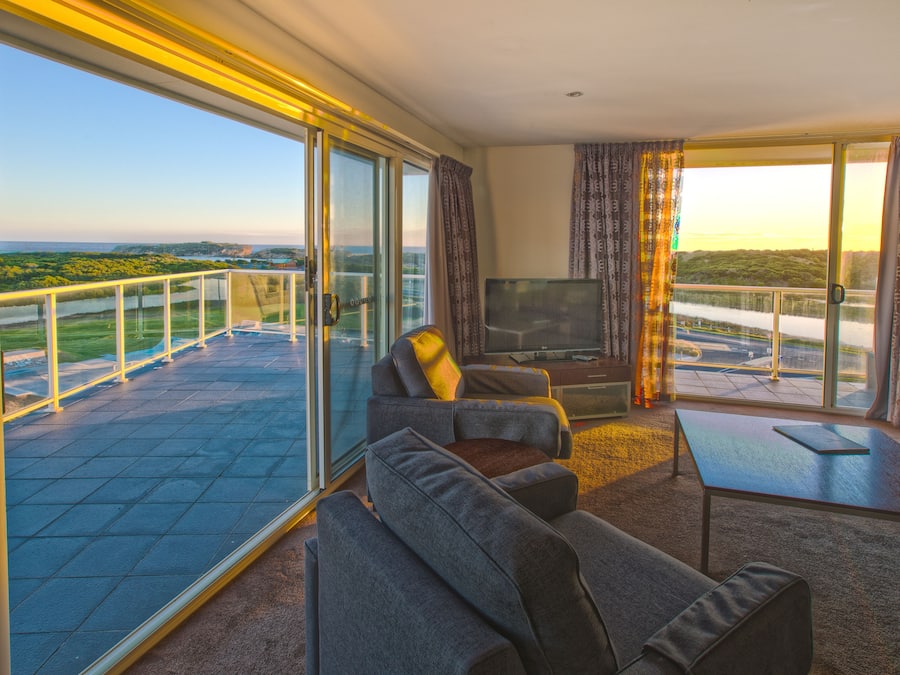 Luxury Three Bedroom Spa Apartment | Living area | 42-inch LCD TV with digital channels, TV, DVD player