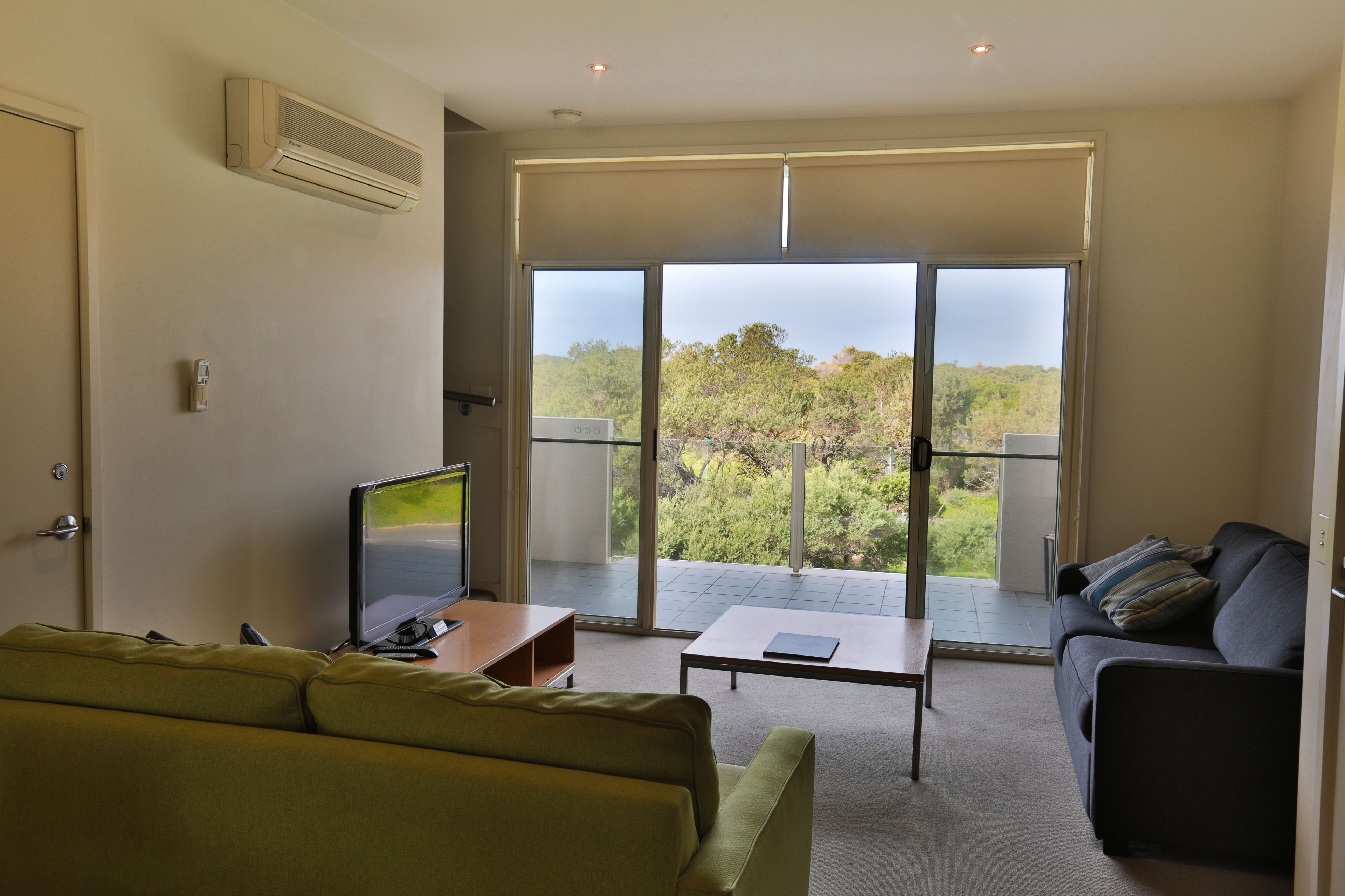 two bedroom spa apartment, split level | individually decorated, individually furnished, desk, laptop workspace