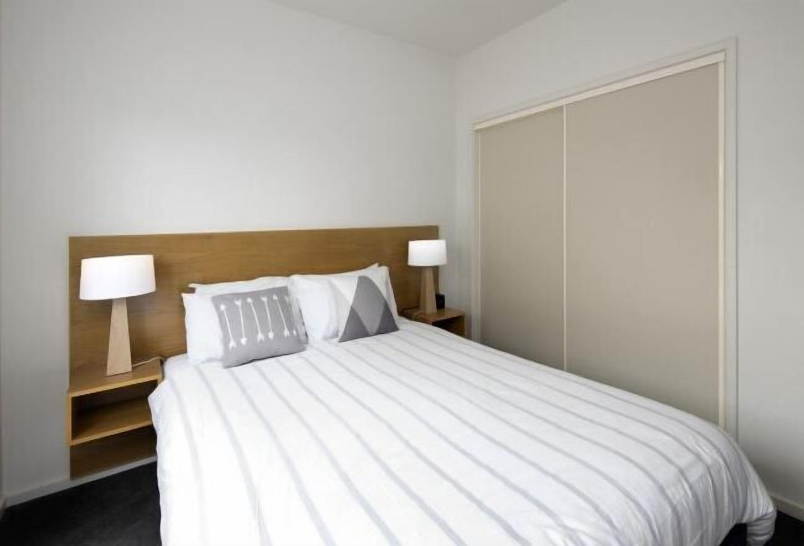 Desk, laptop workspace, blackout curtains, iron/ironing board