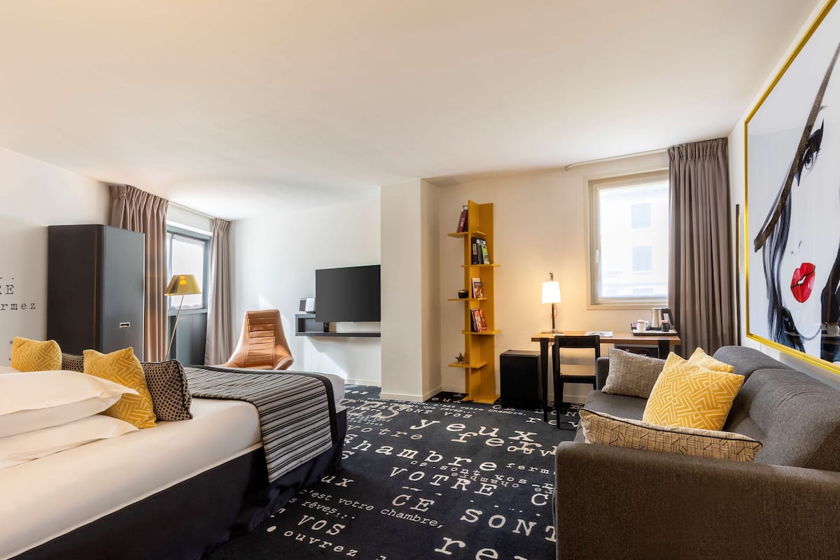 superior room, 1 queen bed, non smoking (with sofabed) | 1 bedroom, in-room safe, desk, laptop workspace