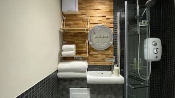 Hair dryer, towels, soap, shampoo