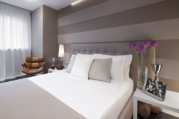 Premium bedding, down duvets, minibar, in-room safe