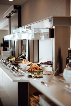 Breakfast, lunch, dinner served; international cuisine