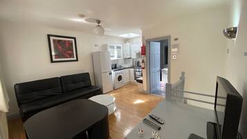 Standard House, 1 Bedroom (with 2 Sofabeds) | Living area | 32-inch flat-screen TV with digital channels, TV, DVD player