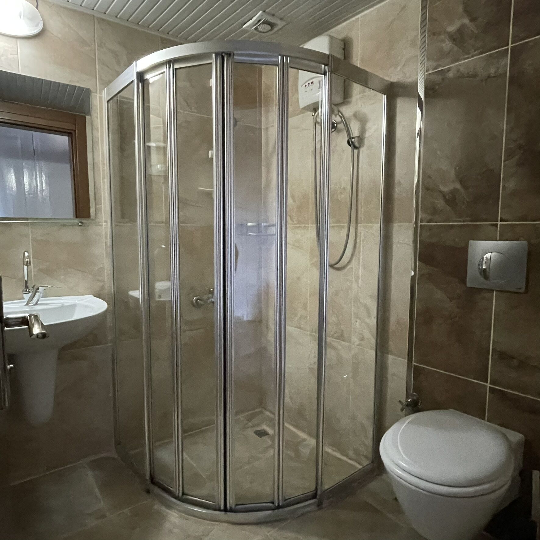 family room | bathroom | shower, free toiletries, hair dryer, slippers