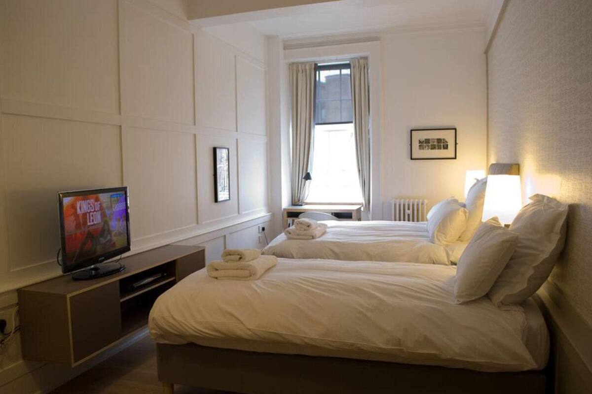 twin room | egyptian cotton sheets, hypo-allergenic bedding, individually decorated