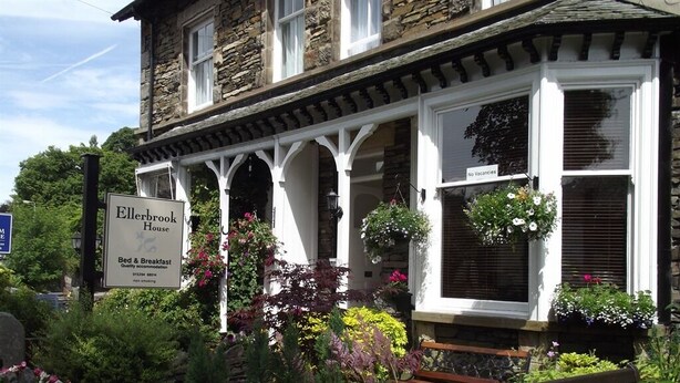 A traditional stone building with a sign for 'Ellerbrook House' offering bed and breakfast accommodations. - Ellerbrook House (Windermere)
