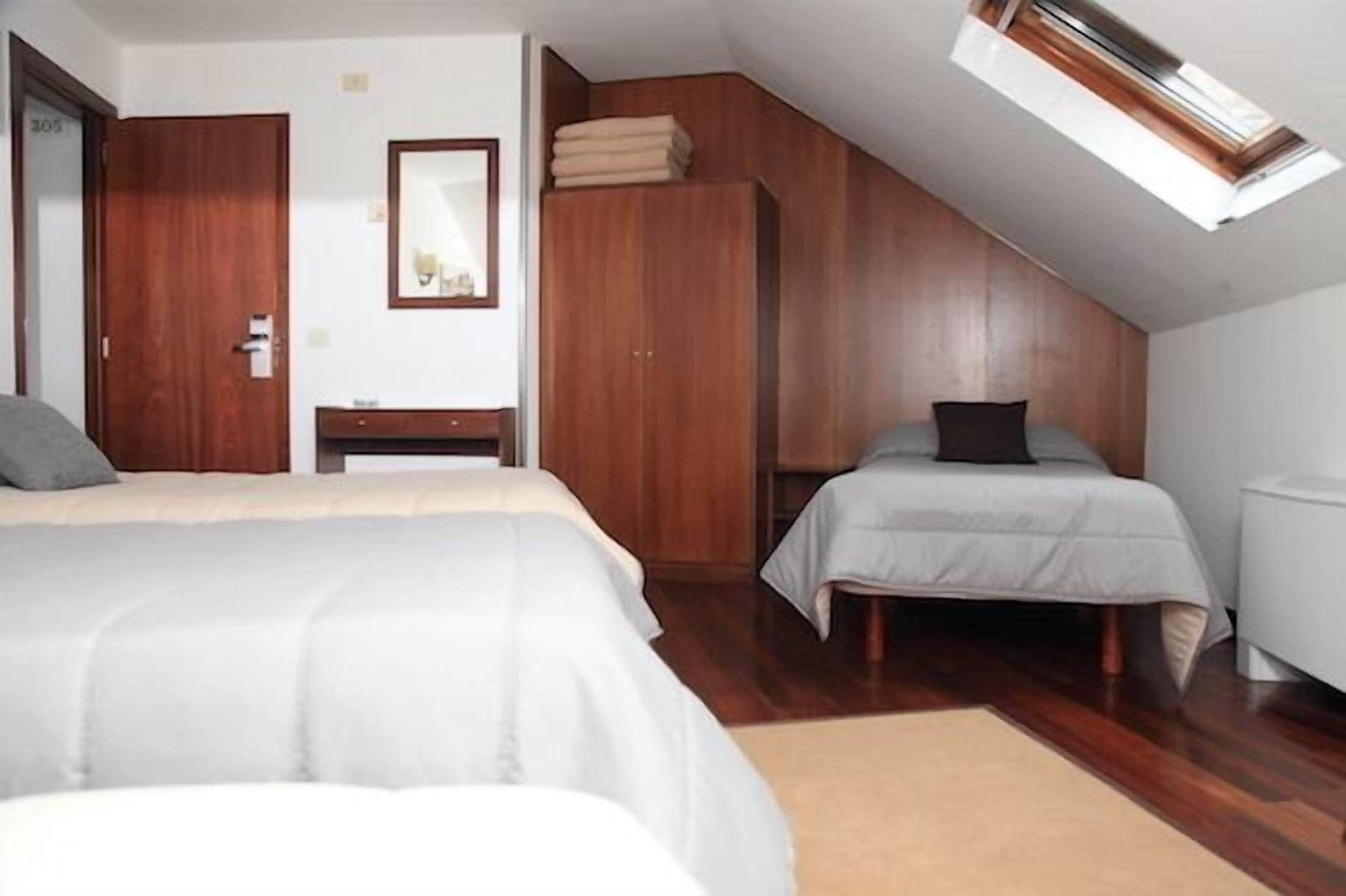 quadruple room | in-room safe, desk, blackout curtains, free cots/infant beds