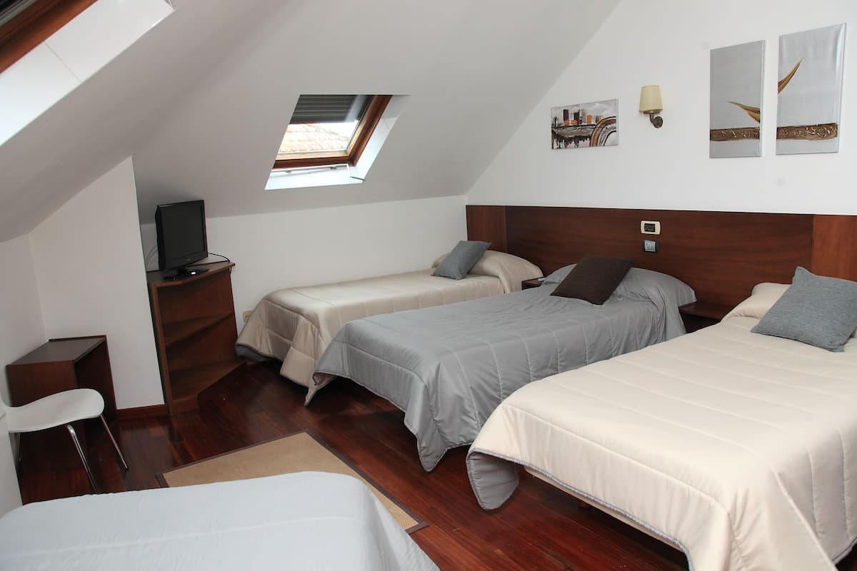 quadruple room | in-room safe, desk, blackout curtains, free cots/infant beds