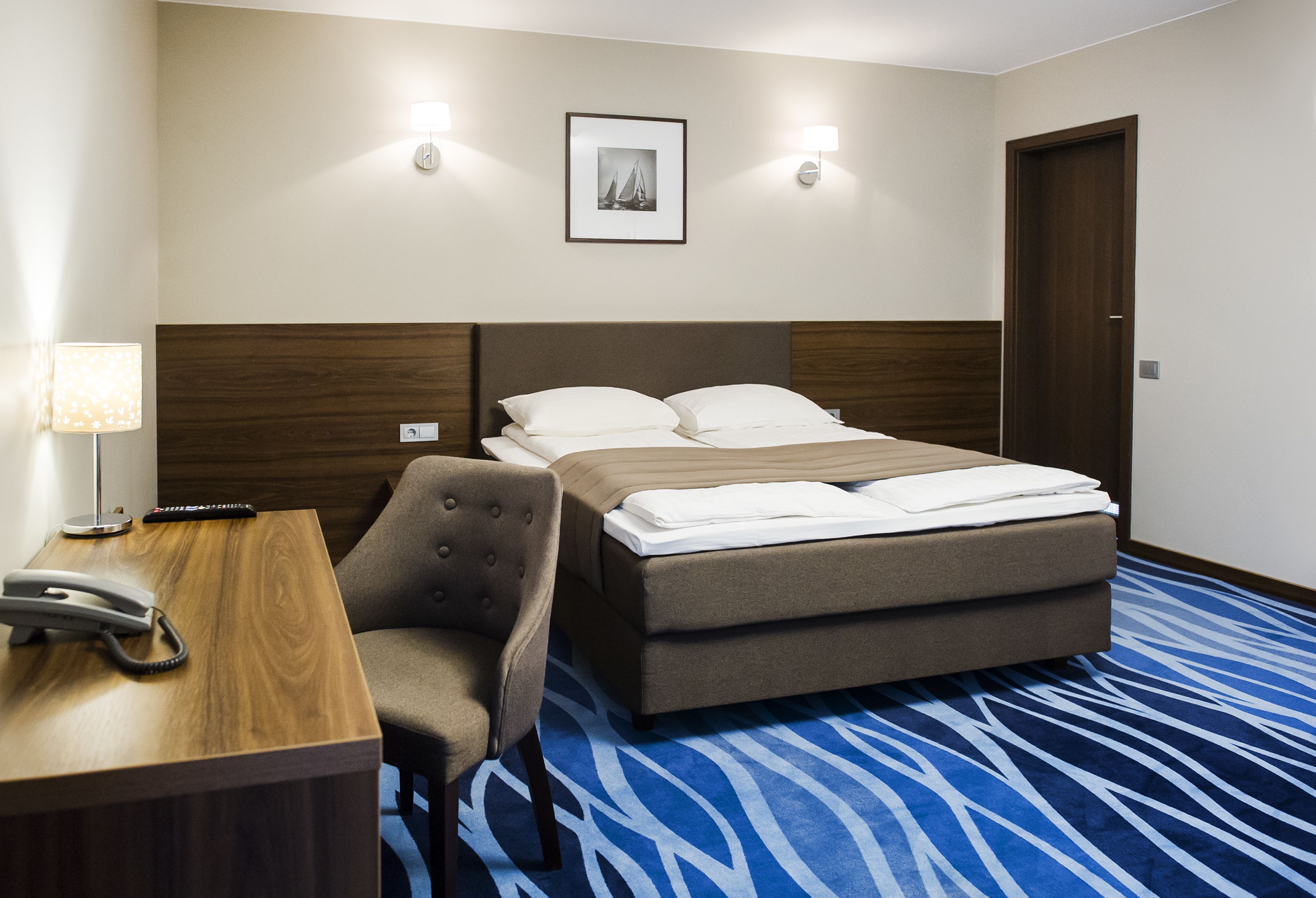 family room | desk, soundproofing, iron/ironing board, free wifi