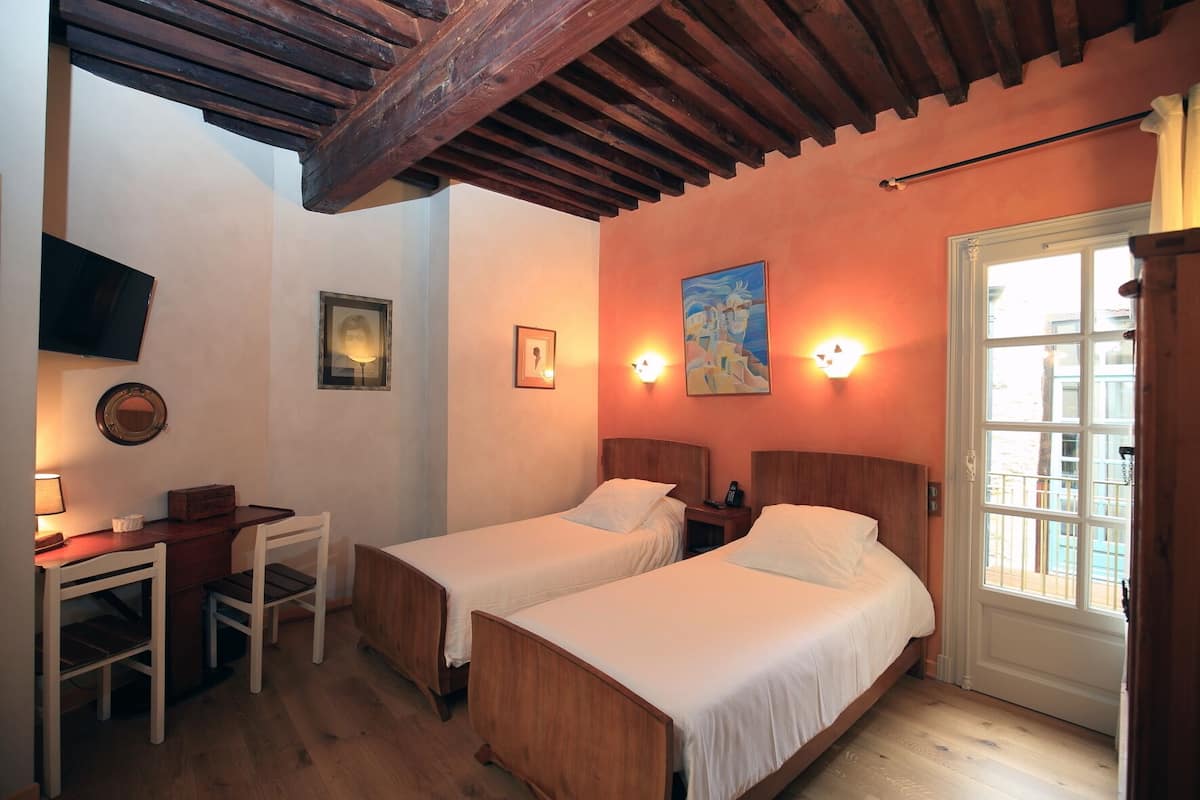 Standaard Twin kamer, en-suite badkamer (Voyageur) | 2 slaapkamers, luxe beddengoed
