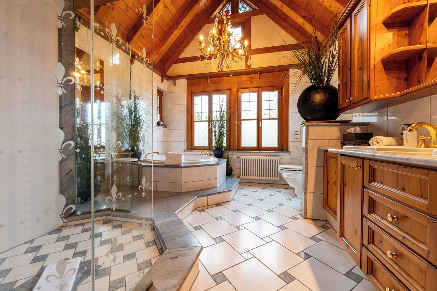 Chalet Kitzbuehel - Grand Lodge | Bathroom | Rainfall showerhead, free toiletries, hair dryer, bathrobes