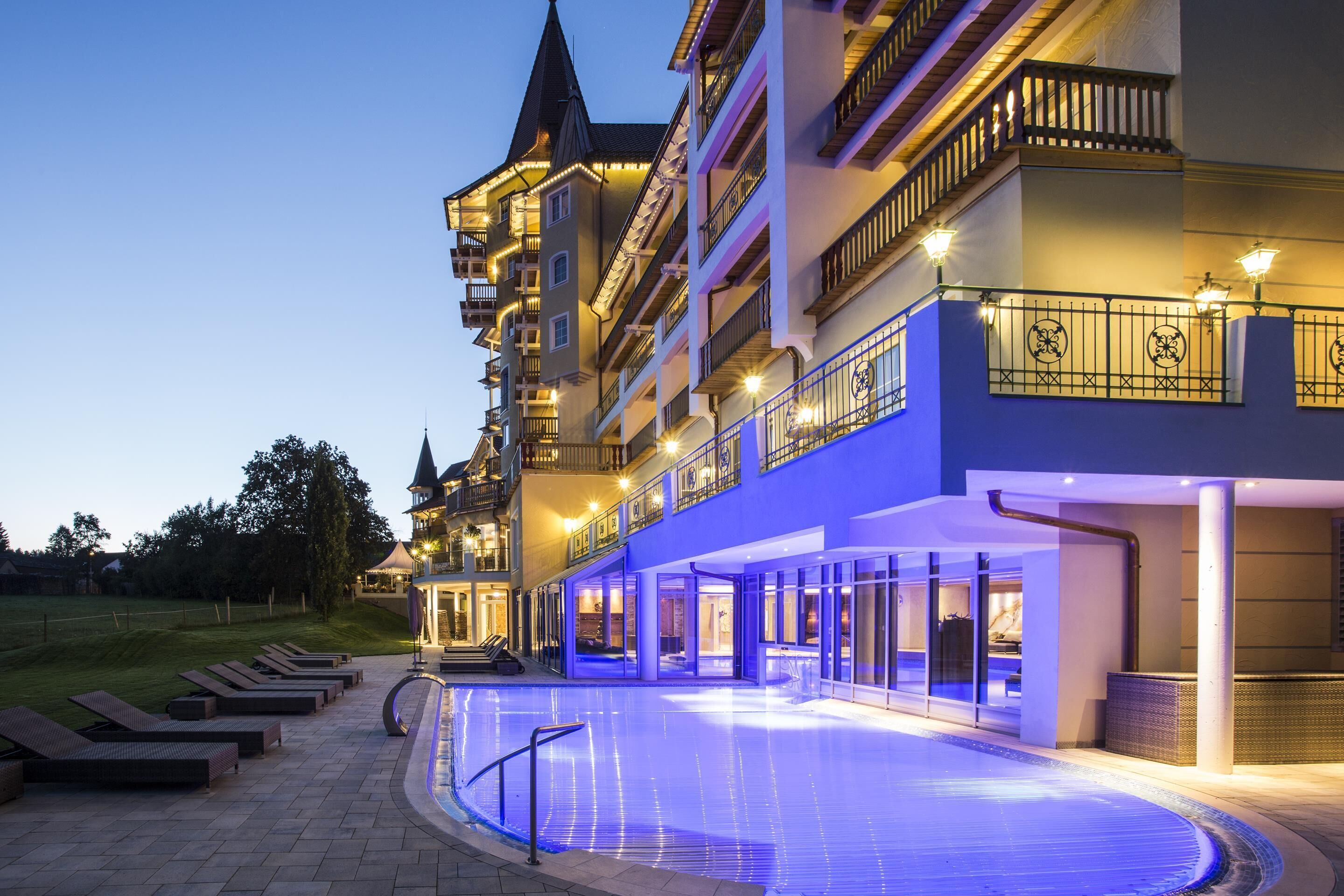 indoor pool, outdoor pool, pool umbrellas, pool loungers